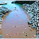 Swimming in volcanic hot springs in Greece